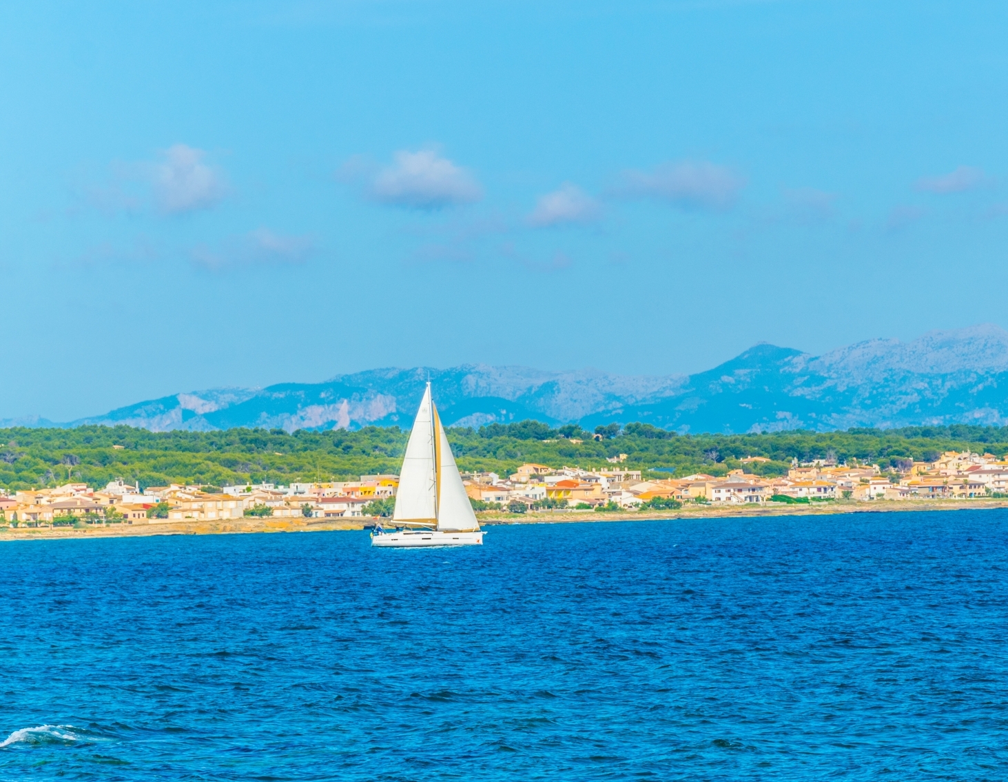 Sail across the Bay of Alcúdia.